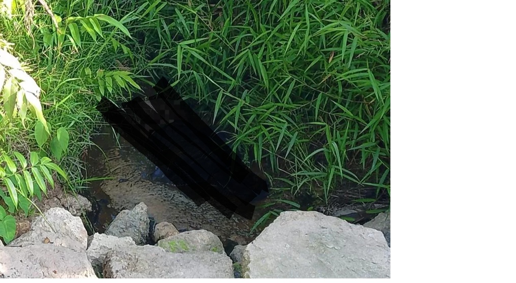 TEMUAN: Mayat perempuan ditemukan di parit pinggir jalan Kota Nanga Bulik, Lamandau, Kalteng, Minggu (25/1/2026) (warga/radar sampit)