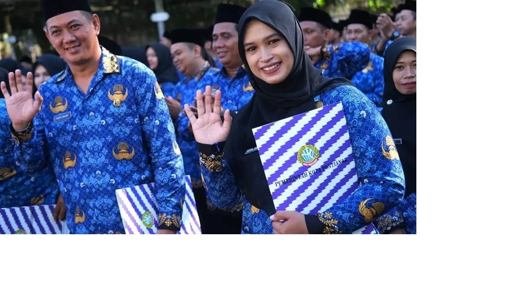 Aturan Baju Korpri Terbaru 2026 mengatur seragam, jadwal pakai, dan atribut resmi ASN sebagai identitas nasional aparatur sipil negara. (ANTARA FOTO/Jessica Wuysang)
