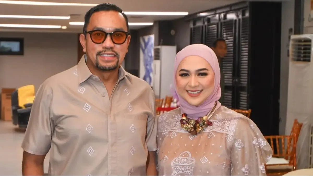 Ahmad Syahroni dan istri.
