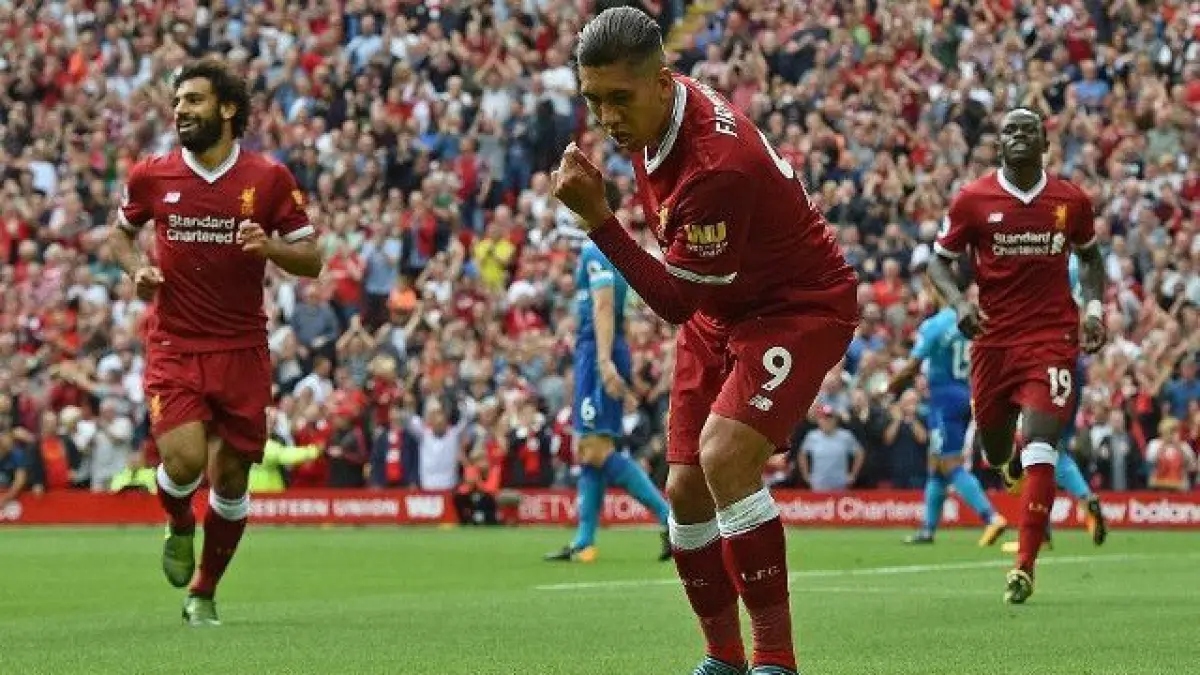 Firmino selebrasi.