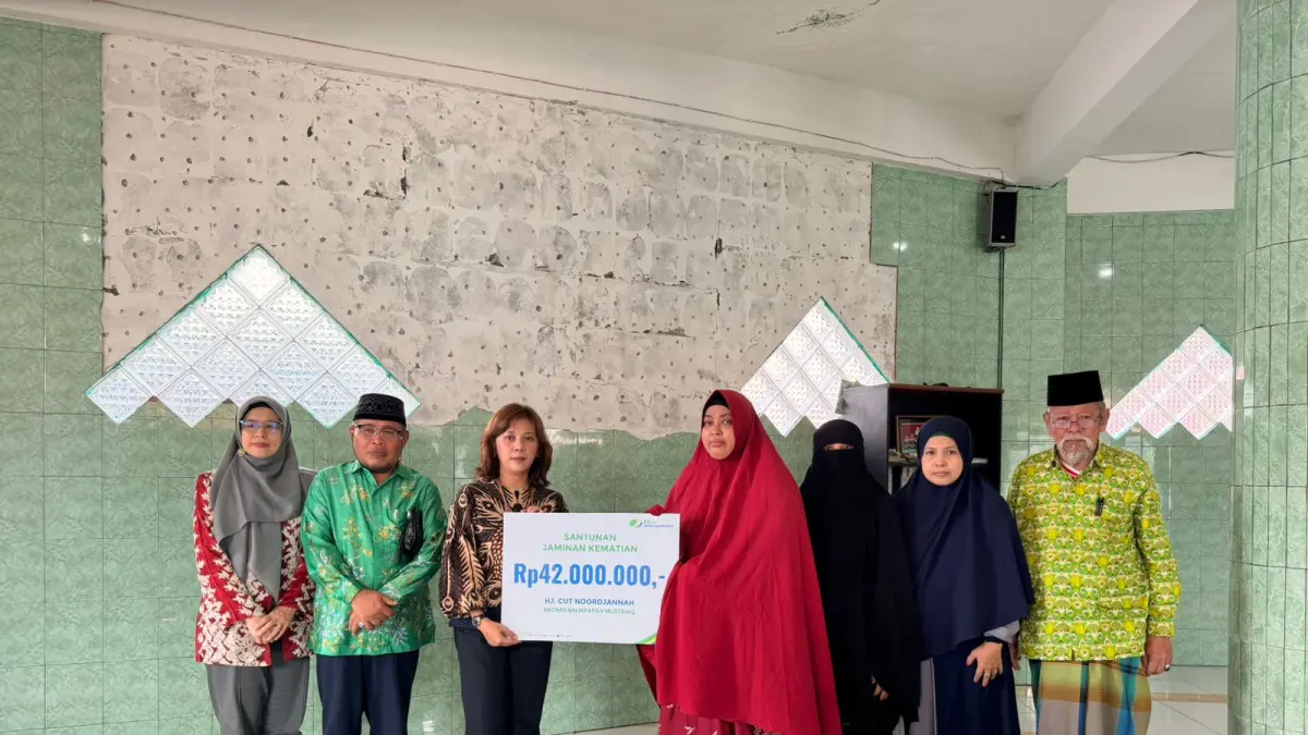 BPJS Ketenagakerjaan Cabang Balikpapan bersama Baznas Kota Balikpapan melaksanakan penyerahan simbolis santunan Jaminan Kematian (JKM) kepada ahli waris peserta yang telah meninggal dunia.