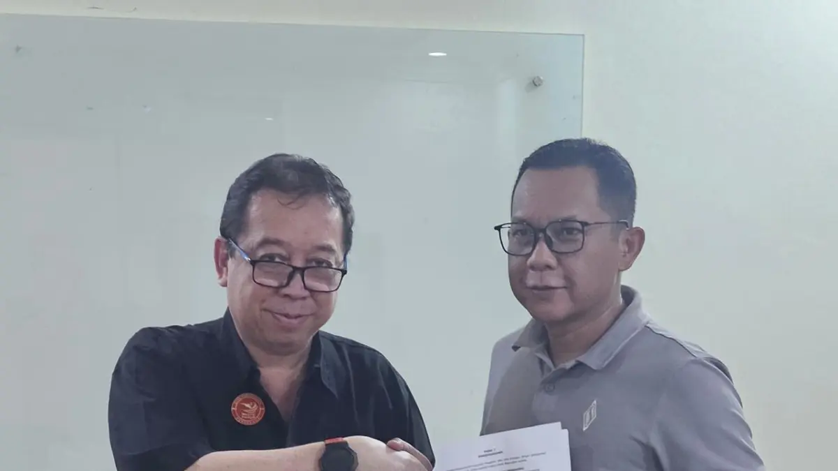 Pj Ketua Kadin Kukar Dedi Sudarya usai MoU dengan Dirut Perusda TP, Awang Muhammad Luthfi (Istimewa)
