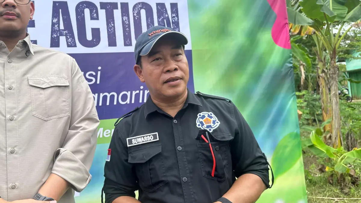 Plt Kepala DLH Kota Samarinda, Suwarso, saat menghadiri kegiatan ESG Climate Action Program Kolaborasi 2.000 Pohon untuk Kota Samarinda di Desa Budaya Pampang, Minggu (7/6/2026).