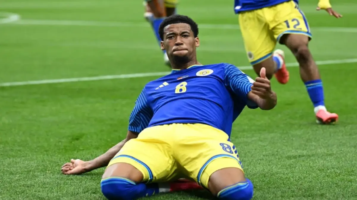 Gelandang bertahan tim nasional Curacao Livano Comenencia merayakan golnya ke gawang Jerman pada laga Grup E Piala Dunia 2026 di Stadion Houston, Houston, Amerika Serikat, Minggu (14/6/2026). AFP/Paul Ellis.