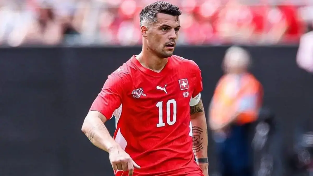 Granit Xhaka memimpin Swiss menghadapi Aljazair.