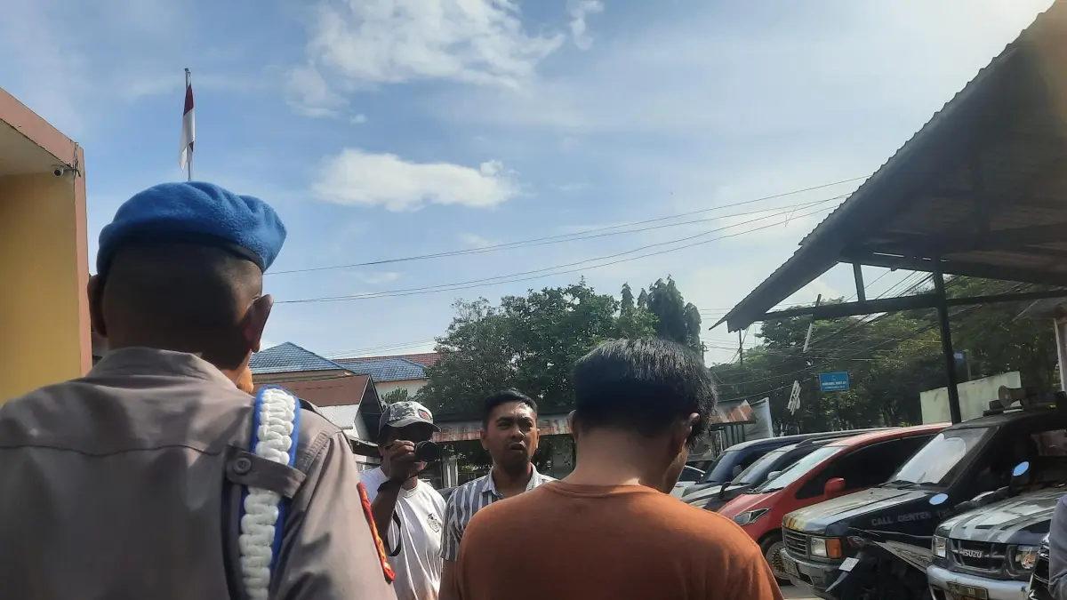 Tersangka.