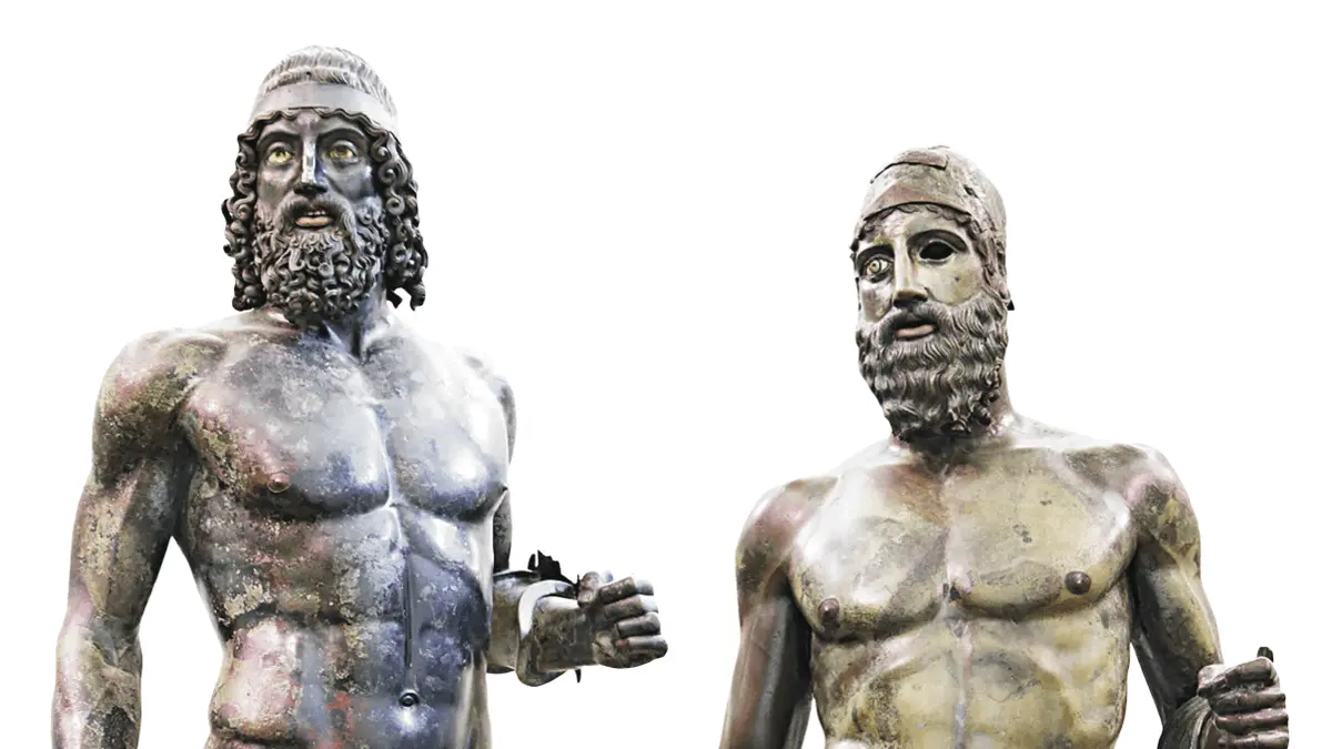 Dua sosok perunggu setinggi hampir dua meter adalah para prajurit yang terbaring di dasar laut selama lebih dari dua milenium: Prajurit Riace (Riace Bronzes).