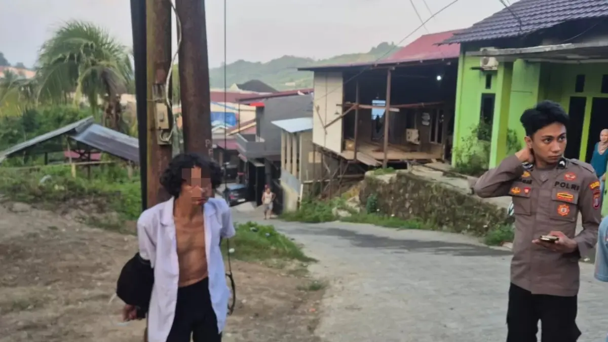 Pria ini diikat ke tiang listrik karena diduga membawa wanita bersuami.