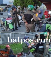PENYAKIT SOSIAL:Petugas Satpol PP saat mengamankan anjal, gepeng, pengamen hingga badut yang melakukan aksi di jalanan, simpang lampu-lampu merah di Kota Balikpapan yang dainggap menggangu ketertiban umum. (FOTO:YUDI DJOHARUDDIN/BALPOS)