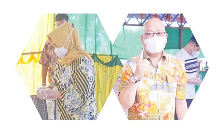 PEMIMPIN BERAU: Calon bupati dan wakil bupati Berau nomor urut 2 saat menyalurkan hak pilihnya.