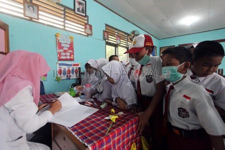 PERSIAPKAN PTM: Sekolah diminta memastikan persiapan penerapan protokol kesehatan sebelum memulai pembelajaran tatap muka. Jam belajar juga bakal dikurangi.