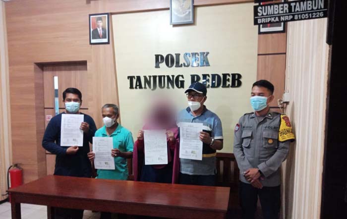 MINTA MAAF: NHH (12) bersama orangtuanya, meminta maaf akibat membuat heboh masyarakat, dengan mengaku diculik dan dilecehkan.