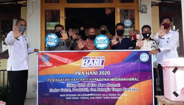 KELILING: BNNK HSS berkeliling kantor desa sosialisasi P4GN ditengah pagebluk. | FOTO: BNNK HSS FOR RADAR BANJARMASIN