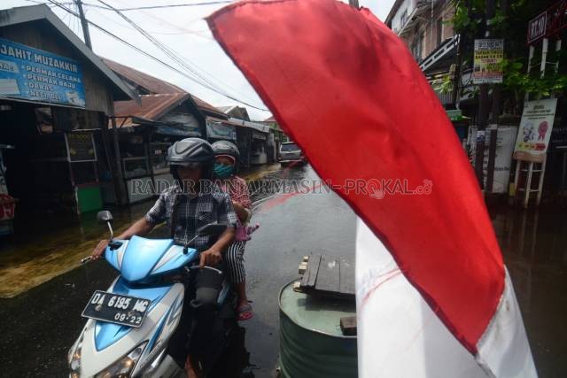 TANPA MASKER: Foto diambil di Kelurahan Pemurus Dalam (25/1). Pemandangan warga tak memakai masker di Banjarmasin kian mudah ditemukan. | FOTO: WAHYU RAMADHAN/RADAR BANJARMASIN