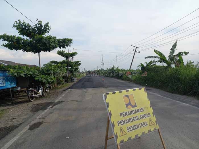 BUKAN PERMANEN: Jalan raya Sungai Buluh sudah diaspal. Kondisi jalan tak lagi bergelombang. Pengendara dapat melintas dengan nyaman.