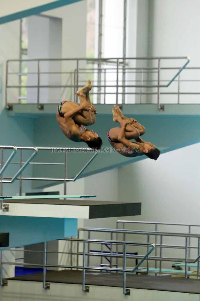 PASANGAN BARU: Pasangan peloncat indah Kalsel Ryan Fadillah dan M Fadhil bertekad memperbaiki hasil yang diraih pada ajang PON XX Papua. | Foto: M Idris Jian Sidik / Radar Banjarmasin