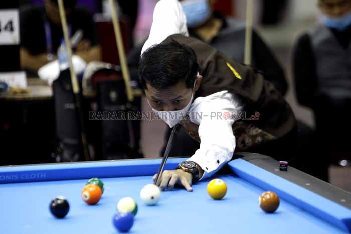 BILIAR: Pebiliar Kalsel Arun yang turun di nomor 9 ball single putra berhasil mempersembahkan tambahan medali emas untuk Kalsel. | Foto: M Idris / Radar Banjarmasin