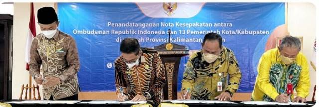 NOTA KESEPAKATAN: Pemkab Tanah Bumbu menekan MoU bersama Ombudsman RI Rabu (30/11) di Jakarta.