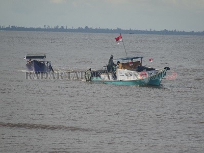 PREDIKSI BMKG: BMKG Kelas III Tanjung Harapan memprediksi dua hari ke depan tinggi gelombang mencapai 0,5-1,5 meter dan hujan lebat di waktu malam hingga dini hari./RACHMAD RHOMADHANI/RADAR KALTARA