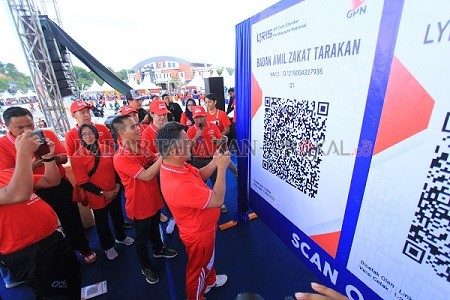 QRIS: Pekan QRIS pada Maret lalu sebelum pandemi. Kini QRIS menjadi solusi akan transaksi keuangan di tengah pandemi./BANK DATA/RADAR TARAKAN