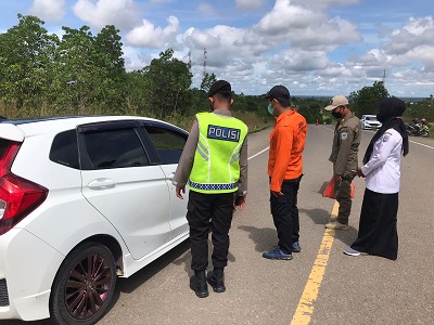 KESIAPSIAGAAN: Tim Satgas Covid-19 Kaltara siap melakukan pengawasan keluar masuk masyarakat di perbatasan Bulungan-Berau.