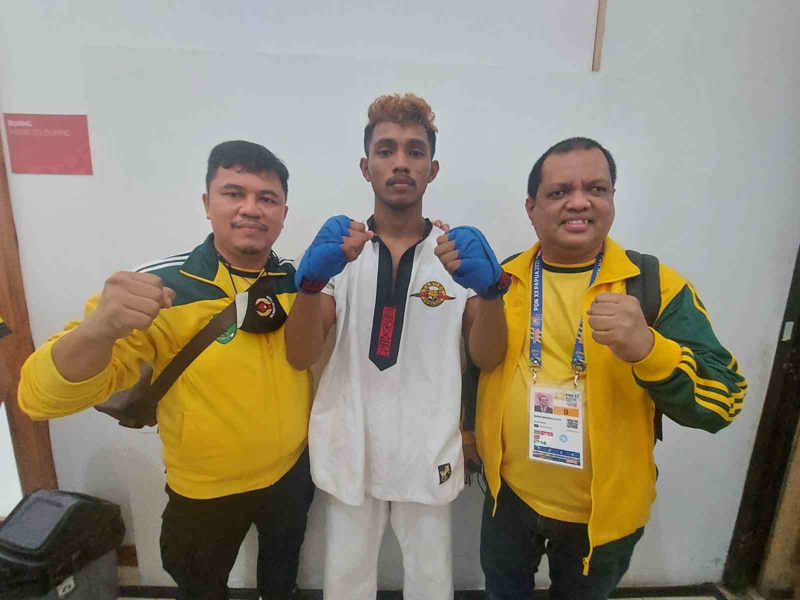 SESUAI TARGET : Nikolaus Toni Sega mempersembahkan emas dari cabor tarung derajat PON Papua 2021.