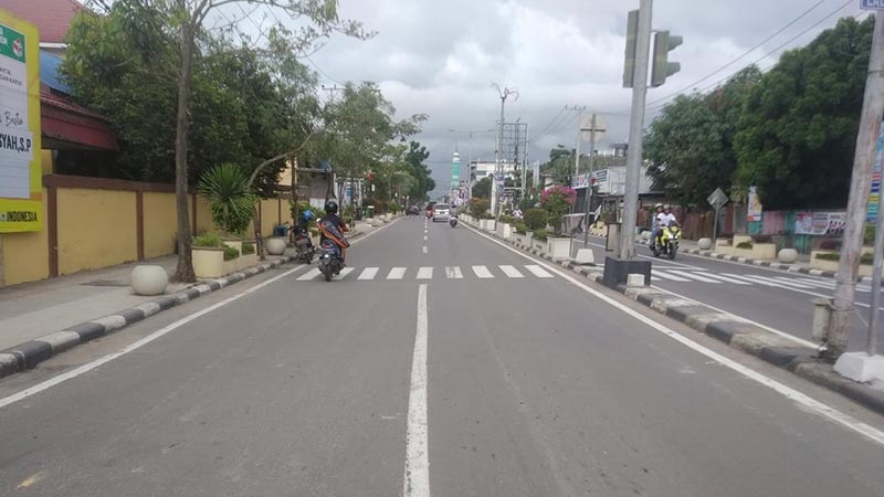 DIHITAMKAN: Pemerintah terus melakukan rehabilitasi terhadap ruas jalan yang ada di wilayah perkotaan.