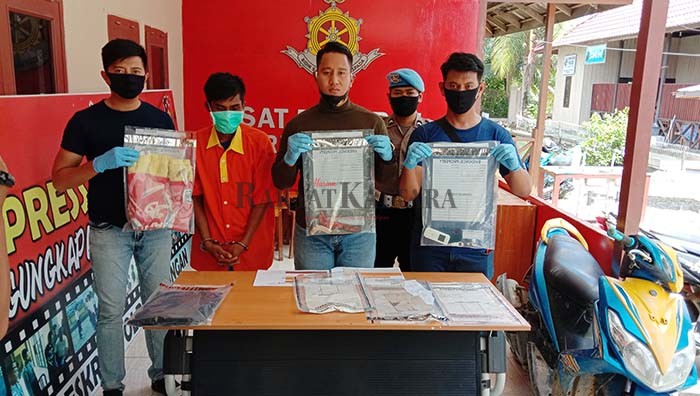 PENYESALAN: Tersangka JK (baju orange) yang berhasil diamankan Polres Bulungan setelah menghabisi nyawa istrinya.