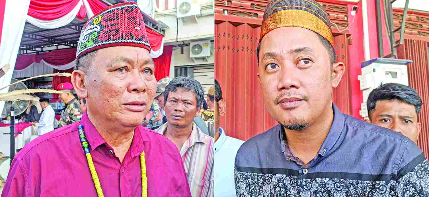 DAFTARKAN DIRI: Dua bakal calon DPD RI, Herman (kanan) dan Jhonny Laing Impang (kiri) saat mendatangi KPU Kaltara untuk mendaftar, Minggu (14/5).
