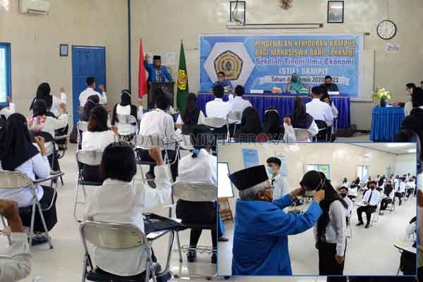 TETAP BERSEMANGAT: Ketua STIE Sampit Thamrin Noor menyemangati  peserta PKKMB, saat memberikan sambutan,  Kamis (13/8).Foto lainnya, Ketua STIE Sampit menyematkan kartu identitas peserta PKKMB, simbol dimulainya kegiatan.(USAY NOR RAHMAD/RADAR SAMPIT)