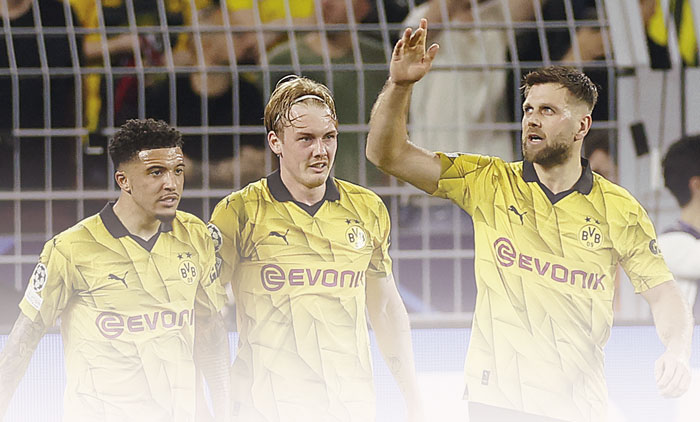 Para pemain Borussia Dortmund melakukan selebrasi usai mencetak gol ke gawang Paris Saint-Germain pada semifinal leg pertama Liga Champions.