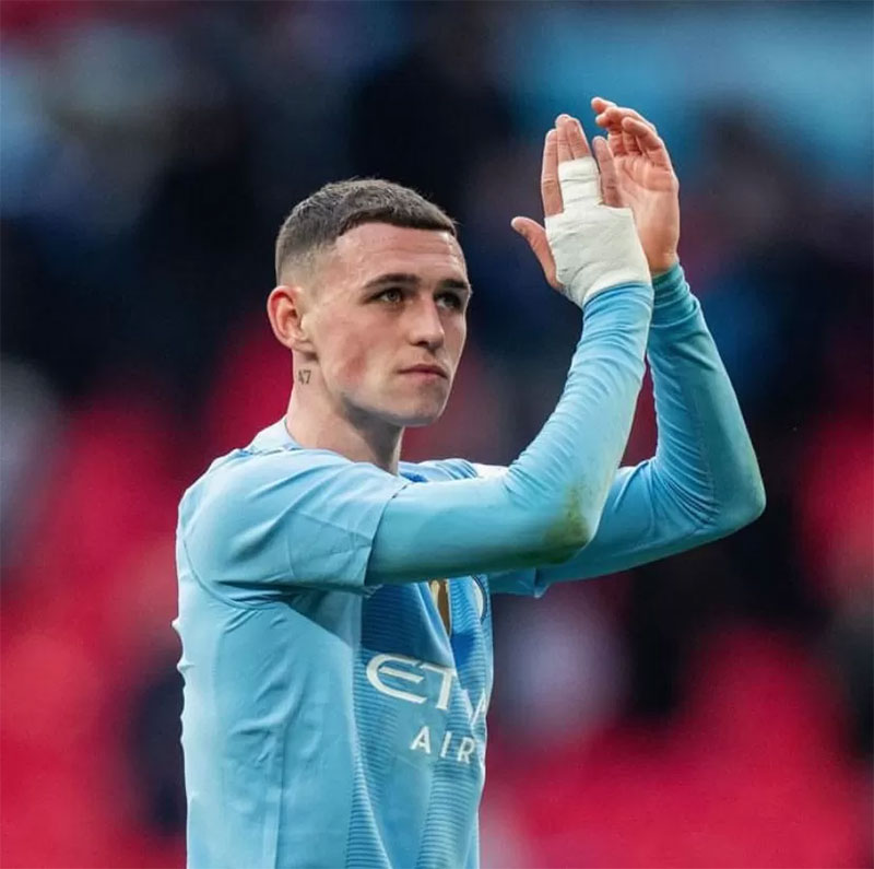 Phil Foden optimistis Manchester City akan ukir sejarah.