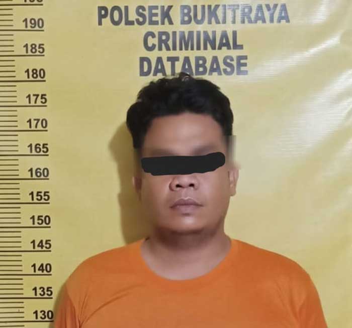 Pelaku begal berinisial MA (28) saat ditetapkan tersangka di Polsek Bukit Raya,