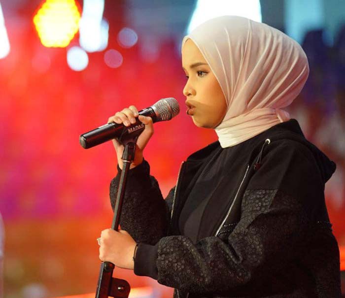 Penampilan Putri Ariani saat menyanyikan lagu  Indonesia Raya.