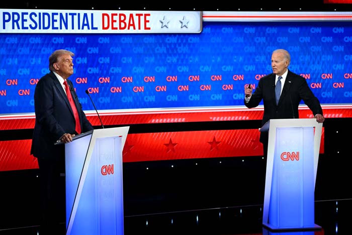 Calon presiden dari Partai Republik Donald Trump dan Presiden AS Joe Biden ikut debat presiden pertama pemilu 2024 di studio CNN di Atlanta, Georgia, Kamis (27/6/2024).