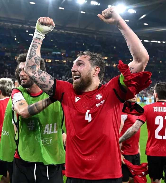 Selebrasi Para pemain Georgia di akhir laga.