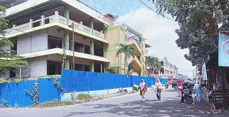 Kondisi badan jalan depan Pasar Wisata Pasar Bawah, Kecamatan Senapelan yang mulai bersih dari aktivitas pedagang kaki lima (PKL), Kamis (29/8/2024).
