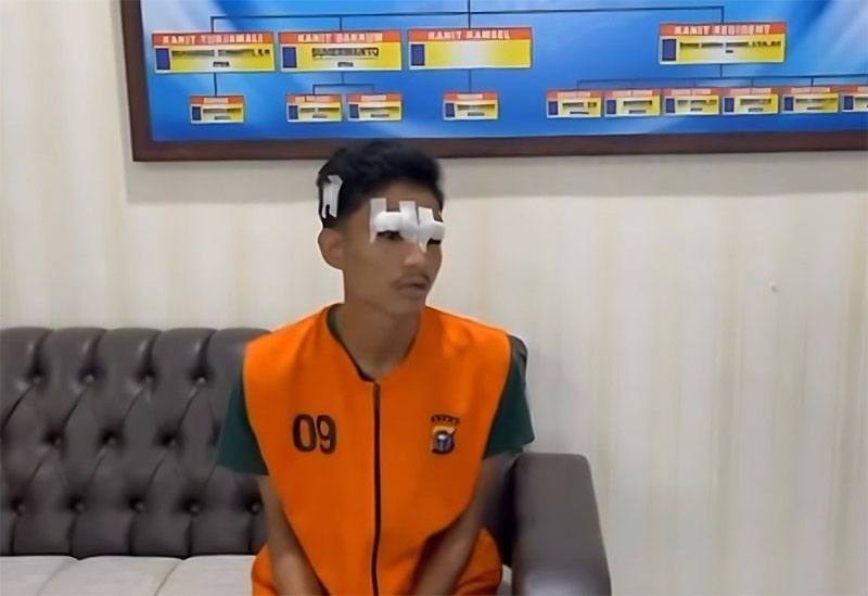 Rizky Saputra (21) sopir maut yang menyebabkan 3 penumpangnya tewas kecelakaan di Tol Pekanbaru-Dumai Km 44 saat ditetapkan sebagai tersangka, Kamis (12/9/2024).