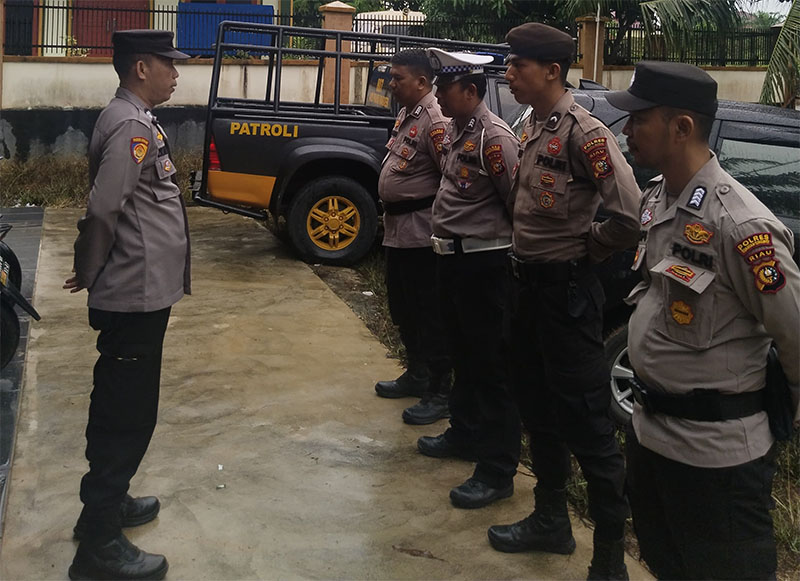 Personel Polres Kuansing lakukan pengamanan gudang logistik KPU, Kamis (26/9/2024).