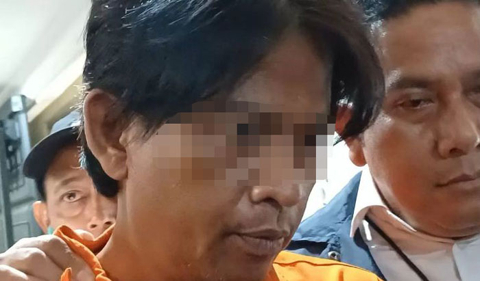 Tersangka Fauzan Fahmi yang merupakan tersangka pembunuhan wanita berinisial SH, yang ditemukan tanpa kepala di wilayah Muara Baru, Jakarta Utara, beberapa waktu lalu.