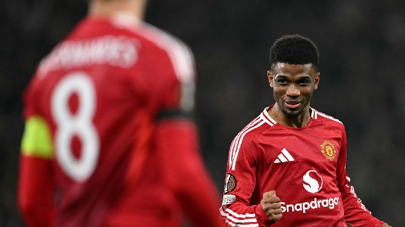 Amad Diallo melakukan selebrasi usai mencetak Manchester United ke gawang PAOK Solanika di Liga Europa.