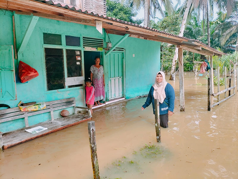 Rumah Warga di Desa Tanjung Medang Kecamatan Hulu Kuantan yang terendam akibat luapan Sungai Batang Ulo, Sabtu (23/11).