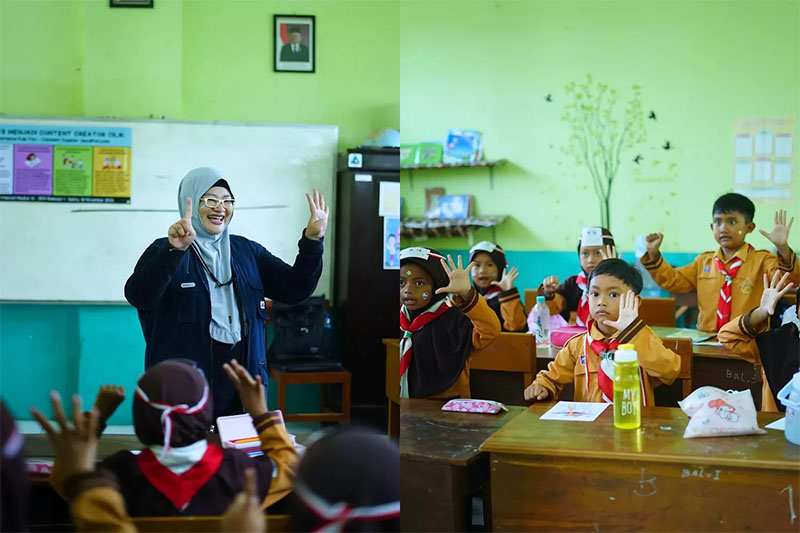 Kak Fitri mengajarkan senam otak pada murid SDN Balerejo 1 Madiun