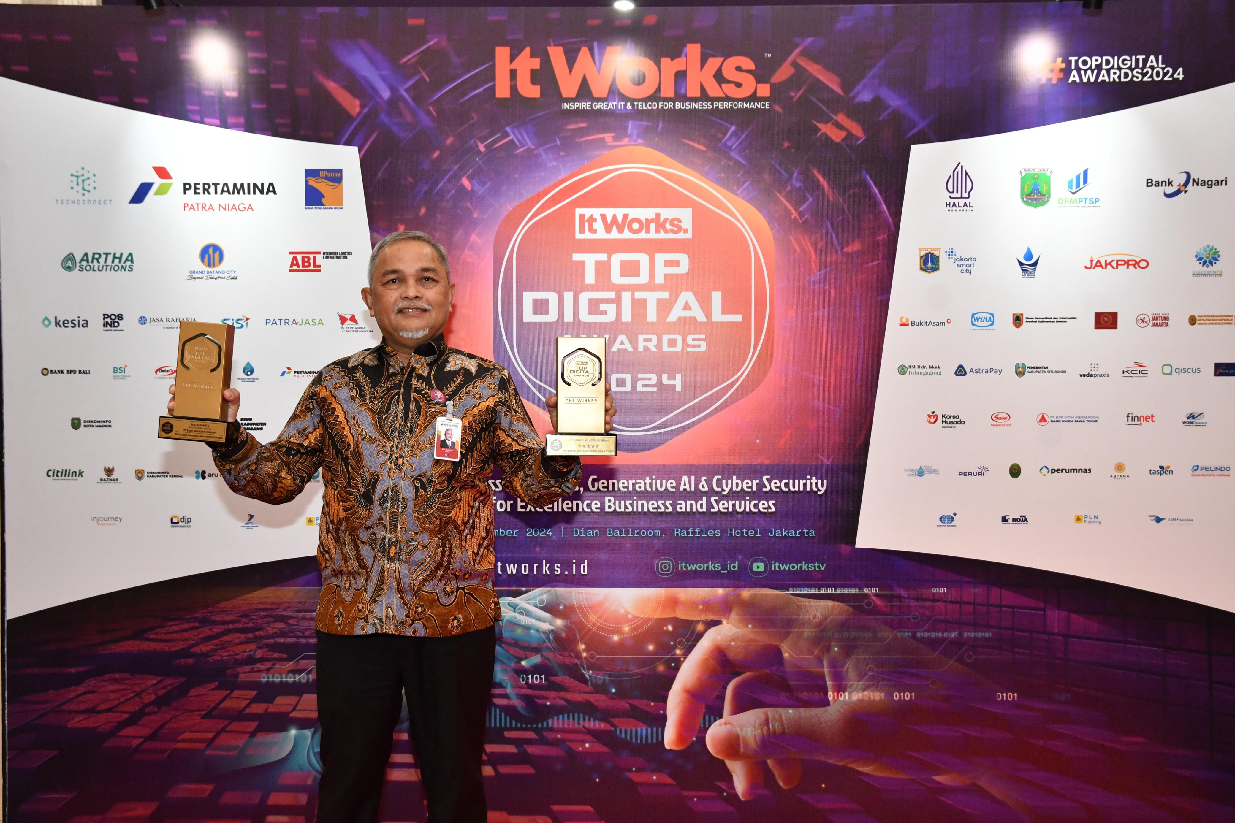 Bank Riau Kepri Syariah kembali menorehkan prestasi gemilang dengan meraih Penghargaan TOP Digital Implementation 2024 Stars 5 dan Top Leader On Digital Implementation 2024