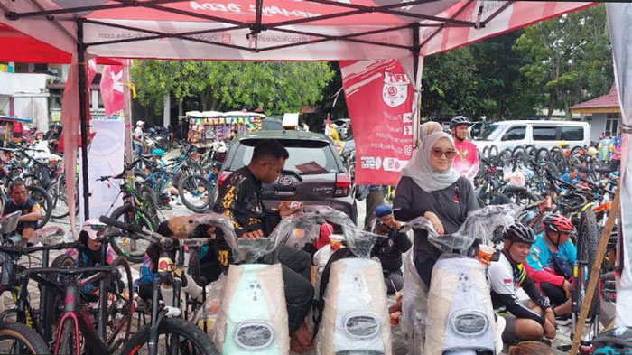 Stand Pacific di Riau Pos Fun Bike di Jalan Sudirman, Pekanbaru, Ahad (19/1/2025).