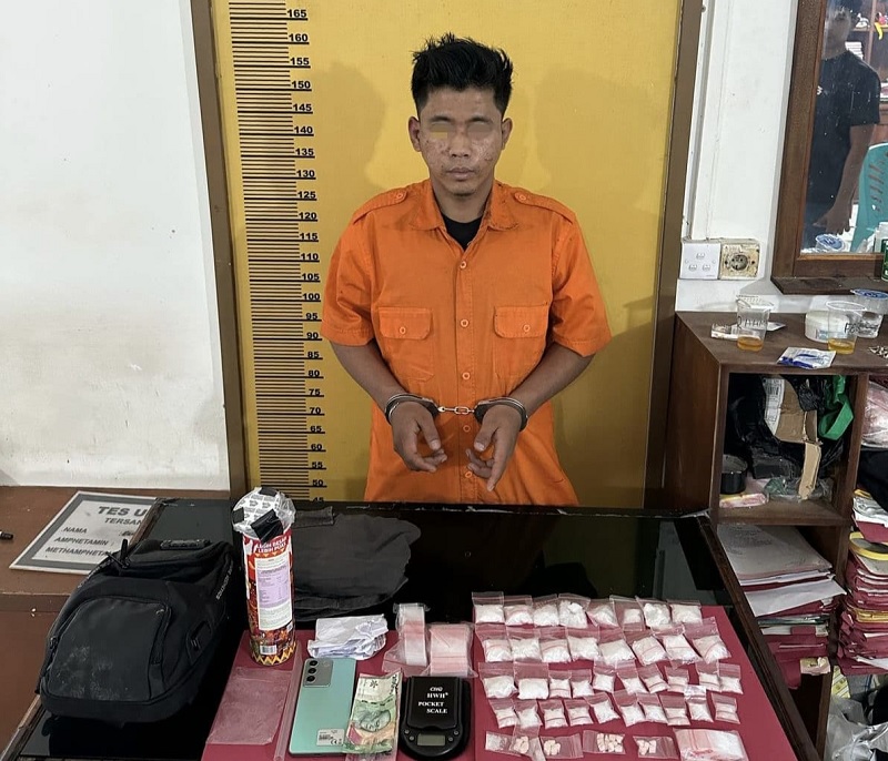Tersangka RH alias Amat