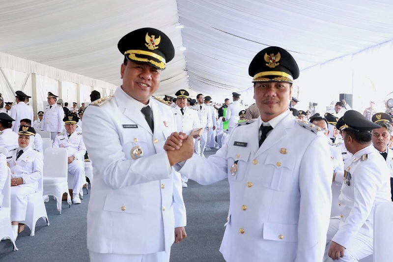 Bupati dan Wakil Bupati Kuansing, Dr H Suhardiman Amby MM-H Muklisin