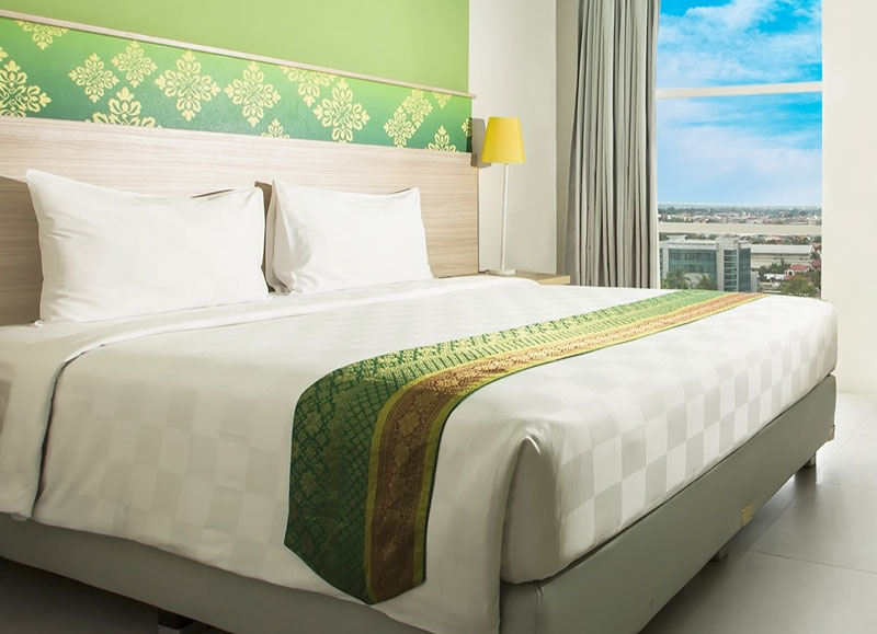 Suasana kamar Khas Pekanbaru Hotel yang nyaman menjadikan momen balek kampung terasa semakin menyenangkan.