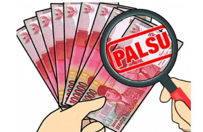 Ilustrasi uang palsu pecahan Rp 100 ribu.
