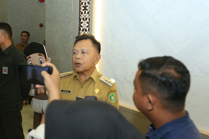 Bupati Kepulauan Meranti AKBP (Purn) H. Asmar, usai menyambangu kantor BPK Riau Senin (26/5/2025).